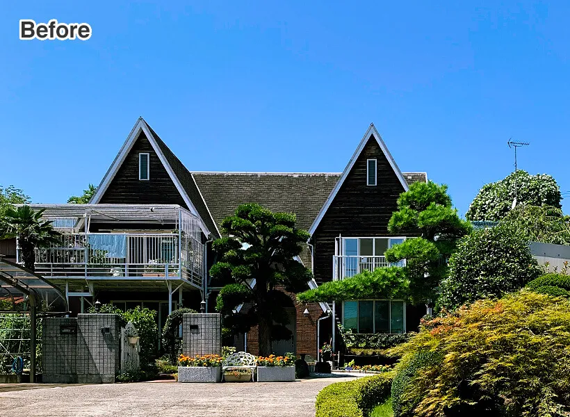 横に並んだ2つの三角屋根とシックな色合いが特徴の住宅外観